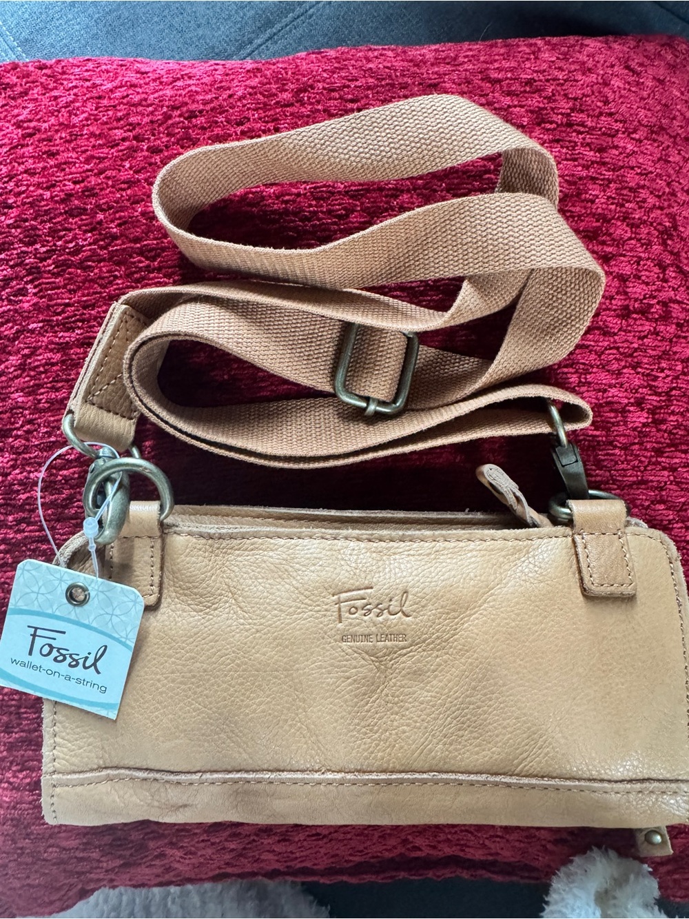 Fossil tan and gold leather crossbody pouch